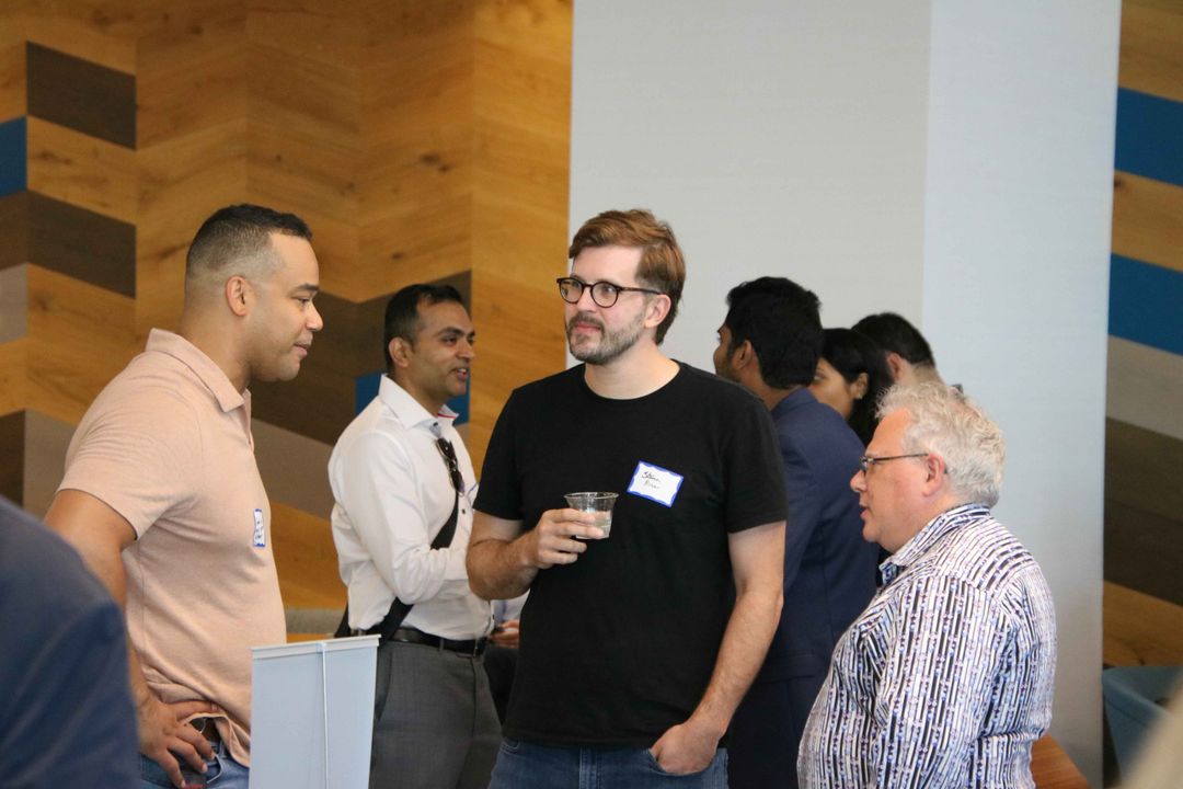 Attendees networking at the 2024 Summit
